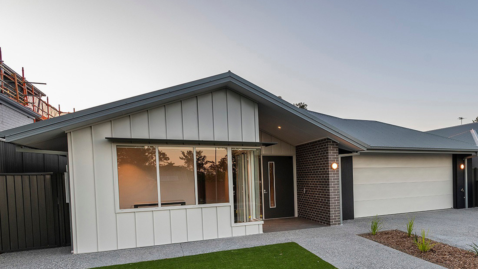 Modern residential sectional doors installed during regional expansion in the 1990s